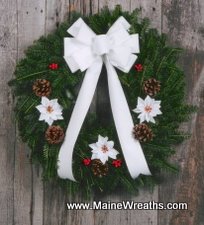 This beautul and fragrant Maine Balsam Christmas wreath is available with red or white ribbons.